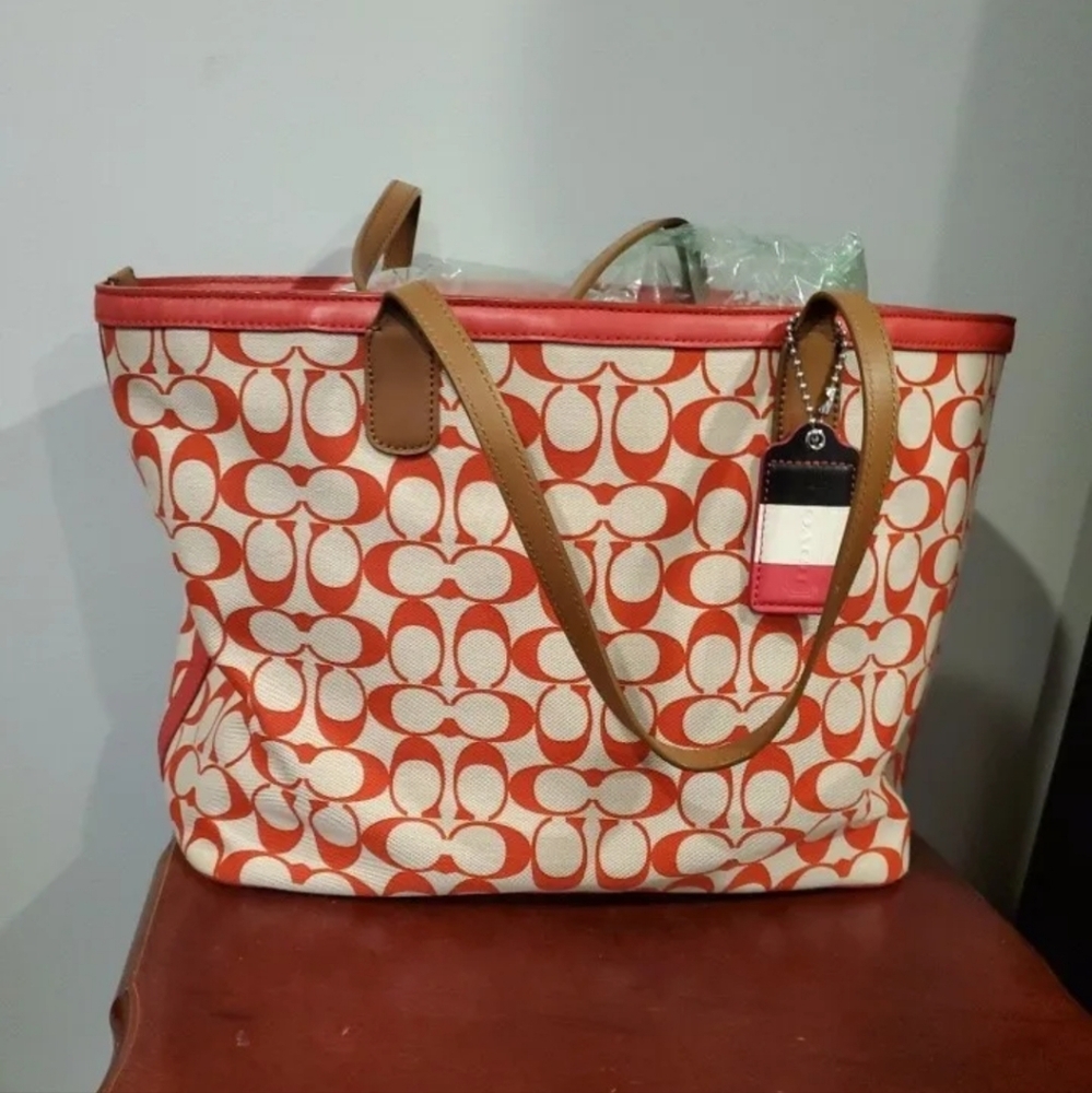 Coach Orange and Cream Signature Canvas Tote with Tan Leather Straps